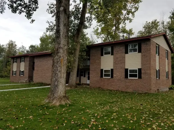 WHISPERING PINES APARTMENTS