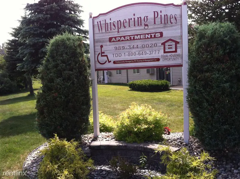 WHISPERING PINES APARTMENTS