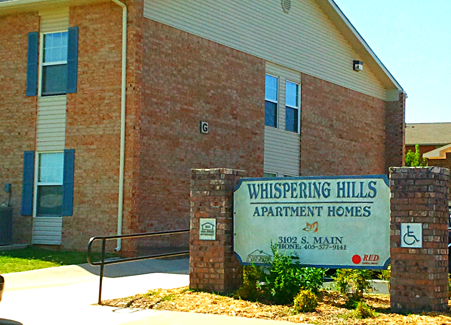 WHISPERING HILLS APARTMENTS