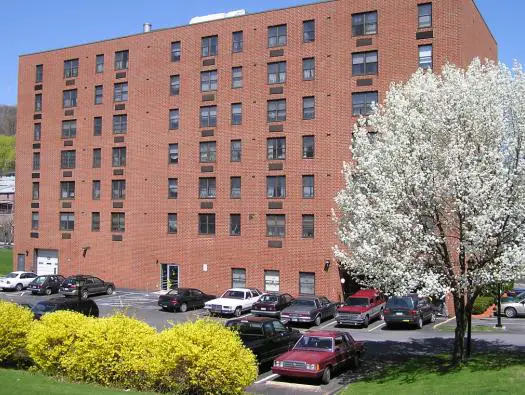QUEEN OF PEACE APARTMENTS