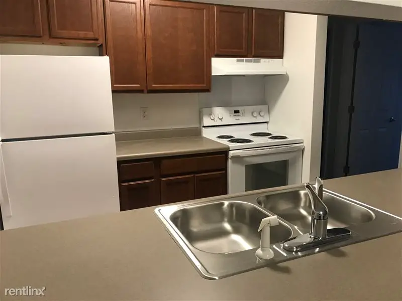 COPPER HILLS APARTMENTS - HOUGHTON