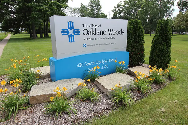 THE VILLAGE OF OAKLAND WOODS